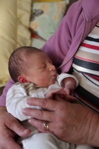 In Nanna's arms, 1 day old. 